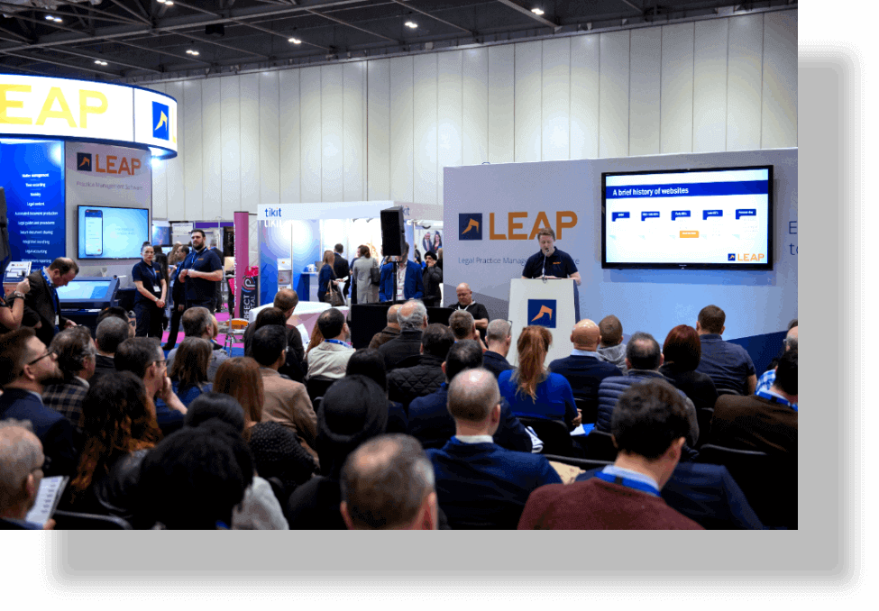 Speaker delivering a seminar to a crowd.